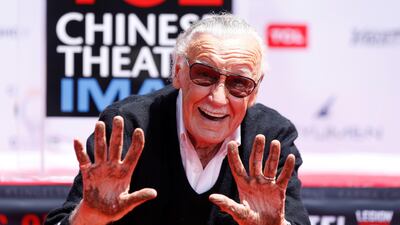 Marvel Comics co-creator Stan Lee shows his hands after placing them in cement during a ceremony in the forecourt of the TCL Chinese theatre in Los Angeles, California. Mario Anzuoni / Reuters
