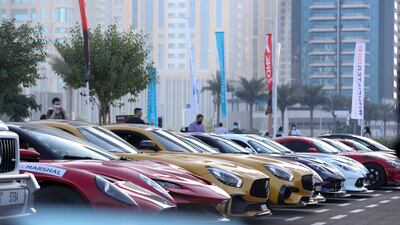 Supercars parked and ready for the parade. Khushnum Bhandari / The National