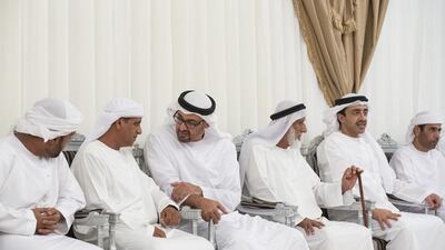 Sheikh Mohammed bin Zayed, Crown Prince of Abu Dhabi Deputy Supreme Commander of the Armed Forces, and Sheikh Abdullah bin Zayed, Minister of Foreign Affairs and International Cooperation, offer condolences the family of Abdullah Mohammed Saeed Al Yamahi,who died in a helicopter crash in Yemen. Seen with father (2nd L) and grandfather (4th L) of Mohammed Saeed Al Yamahi. Ryan Carter / Crown Prince Court - Abu Dhabi
