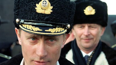 Putin watches the tactical exercises of the Northern Fleet in the Barentsevo Sea from the "Karelia" nuclear submarine on April 06, 2000. AFP