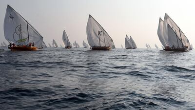 Dhows out on the Arabian Gulf.
