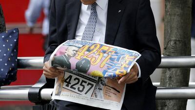 A man takes a look at an extra of a Japanese sports newspaper reporting Miami Marlins player Ichiro Suzuki’s 4,257th hit, in Tokyo, Thursday, June 16, 2016. Suzuki raised his career total in the Japanese and North American major leagues to 4,257, passing Pete Rose’s record Major League Baseball total in a game between the Marlins and the San Diego Padres in San Diego. (Shuji Kajiyama/AP Photo)