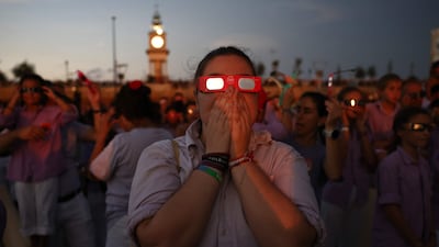 Watchers in the port of Tarragona, north-eastern Spain. AFP