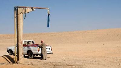 More than a million Syrians are enduring the driest winter in decades, the fifth consecutive season of droughts and crop failures which have forced tens of thousands of farming families to abandon their land. Above, a beduin man at a water collection point, in eastern Homs governorate.