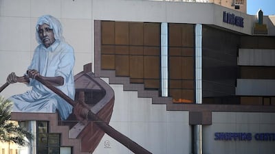 The historic street is the latest area to take part in a project that will eventually see work from local and international artists displayed across the city as well as in the mountain town of Hatta. Tom Dulat / Getty Images