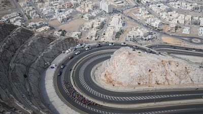 The pack rides during the annual Muscat Classic cycling race, in Oman's capital. AFP