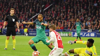 Lucas Moura bundles home his second goal on the night. Getty
