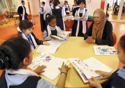 Pupils at the Mohammed Bin Khaled Cycle1 school in Al Ain are being taught using books featuring Emirati charcters. Satish Kumar for The National