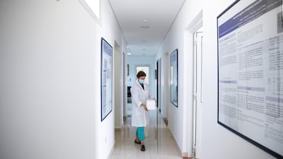 To produce multiple embryos, the chosen female camel is given hormones to stimulate the release of many eggs, and is mated with a high-end male, such as a top racing animal. Reem Mohammed / The National