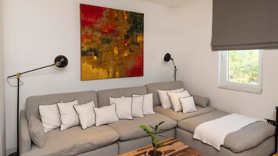 My Own Home Lyn Helbling and her husband Alejandro at their refurbished villa in Jumeirah Park. The upstairs living area. Antonie Robertson/The National