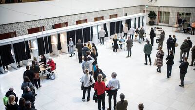 Voters queue in Odense's Town Hall. AFP