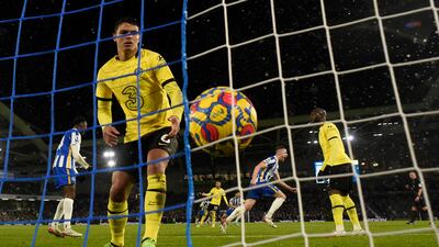 Brighton & Hove Albion's Adam Webster celebrates scoring their first goal as Chelsea's Thiago Silva reacts. Reuters