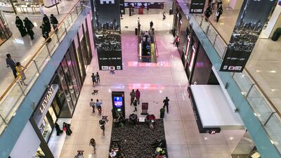 UAE shoppers lead the world in webrooming, with 53 per cent of people using a smartphone to research their purchases. Reem Mohammed / The National