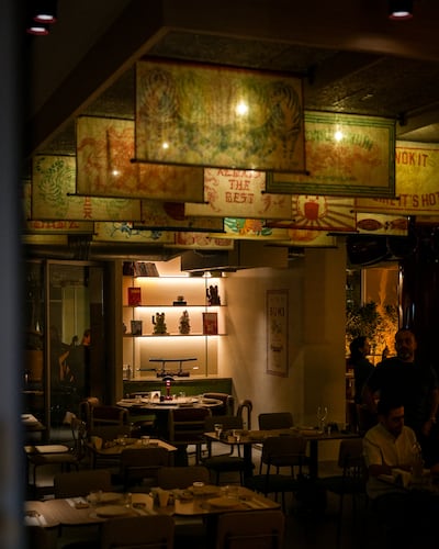 The decor at Suki is filled with fun Japanese night-market style elements, including hanging cloth banners decorated with Asian motifs. Photo: Reif Othman
