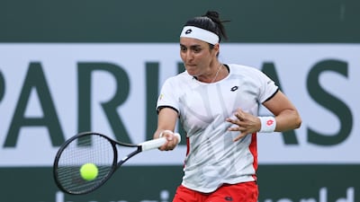 Ons Jabeur of Tunisia plays a forehand against Anett Kontaveit. AFP
