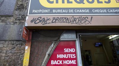 Messages supporting Brixton Arches are sprayed above a shop in the area. Dan Kitwood / Getty