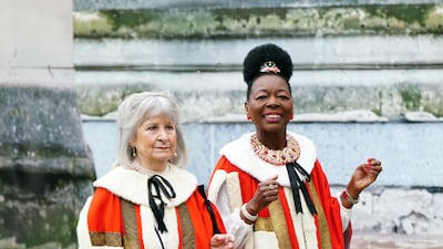 Baroness Floella Benjamin, right, arrives at Westminster Abbey. Getty Images