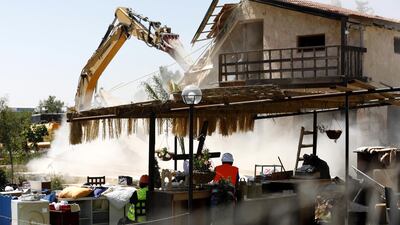 The bulldozers come in.