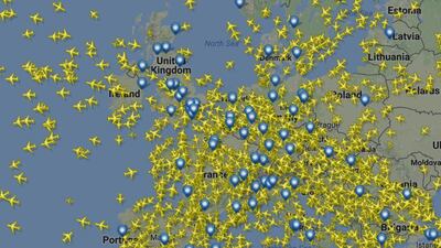 The United Kingdom faced a record number of flights, as shown in this still of planes flying in and out of the country this afternoon (FLIGHT RADAR)