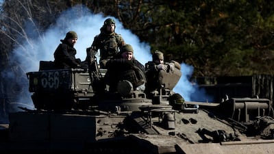 Ukrainian servicemen near the front line in Vuhledar. Reuters