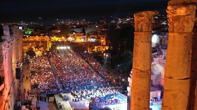 Fans watch Palestinian singer Mohammed Assaf during the annual Baalbeck International Festival (BIF) in Baalbeck, Beqaa Valley, Lebanon, 20 July 2019. The festival runs from 05 July to 03 August 2019. Photo: EPA