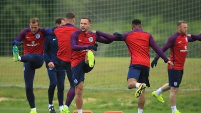 Danny Drinkwater of England and team mates warm up during an England training session at London Colney on May 30, 2016, near St Albans, England (Photo by Ben Hoskins/Getty Images)