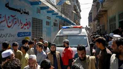 An ambulance at the school. The collapse took place in the middle of the school day. AFP
