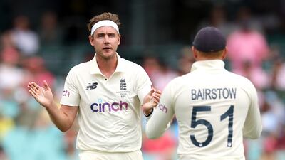 Stuart Broad and Jonathan Bairstow of England celebrate the wicket of David Warner of Australia. Getty Images