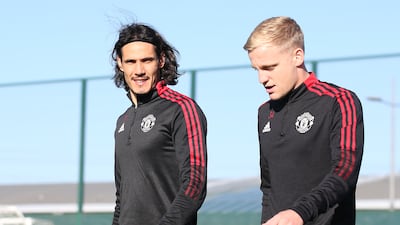 Edinson Cavani and Donny van de Beek of Manchester United in action during a first team training session at Carrington Training Ground.