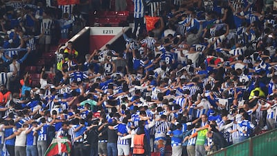 Real Sociedad fans celebrate after their first goal. Getty