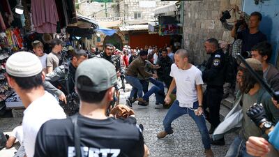 Israelis fight with Palestinians near the Damascus Gate to Jerusalem's Old City. Reuters