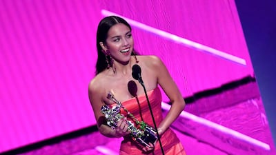 Olivia Rodrigo accepts the Best New Artist award. AFP