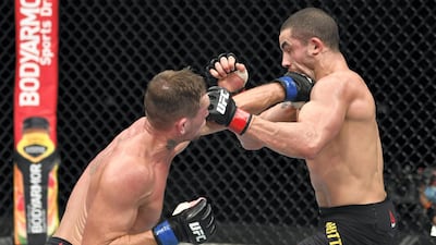 Darren Till lands a left on Robert Whittaker. Getty