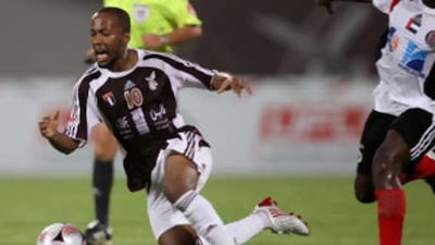 Al Wahda's Ismail Matar runs with the ball.