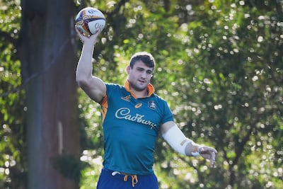Australia's Nick Champion de Crespigny catches a ball during a training session. AP