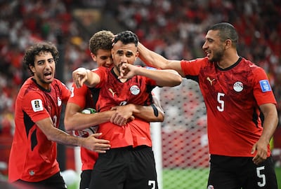 Egypt's Mahmoud Trezeguet celebrates scoring their third goal. Reuters