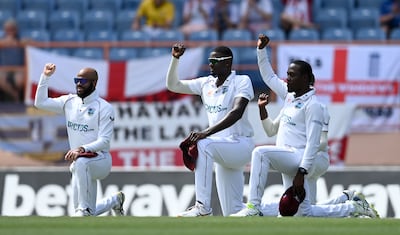 West Indies players take the knee ahead of day one of the third Test against England in Grenada on March 24, 2022. Getty Images