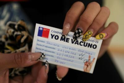 Chilean athletes travelling to Tokyo for the Olympics receive the Covid-19 vaccine in Santiago, Chile. Ivan Alvarado / Reuters