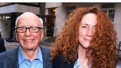 Rebekah Brooks, right,, with Rupert Murdoch, was the chief executive of Murdoch's British newspaper arm and previously served as editor of News of the World. Ian Nicholson / AP Photo