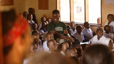 Pupils from the UAE volunteer at a school in Tanzania. Photo: Camps International