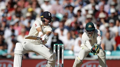 Australia wicketkeeper Tim Paine takes a catch to dismiss Rory Burns of England. Getty