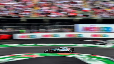 Lewis Hamilton powers his car through a corner. AFP