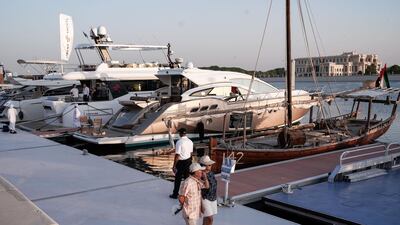 People arrive on the first day of the boat show.