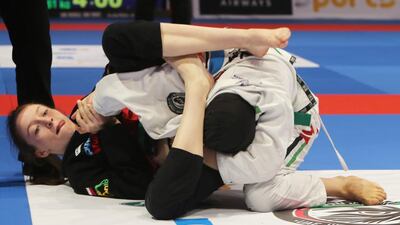 Mahra Al Hinaai, right, of the UAE shown in her match with Aneta Pokarna of the Czech Republic in the Abu Dhabi World Youth Jiu-Jitsu Championship 2016. Ravindranath / The National