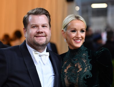 James Corden and his wife Julia Carey. AFP