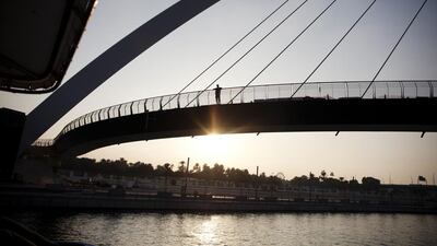 Sunset cruising along the new Dubai Canal in a Gulf Craft luxury yacht. Courtesy Anna Nielsen for The National