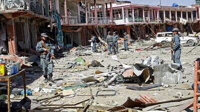 Afghan security forces at the site of a suicide attack in Ghazni on September 4. Rahmatullah Nikzad / AP Photo