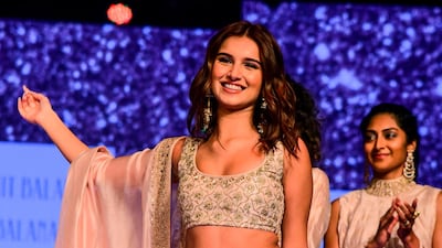 Tara Sutaria presents a creation by Punit Balana during Lakme Fashion Week in Mumbai on February 15, 2020. AFP