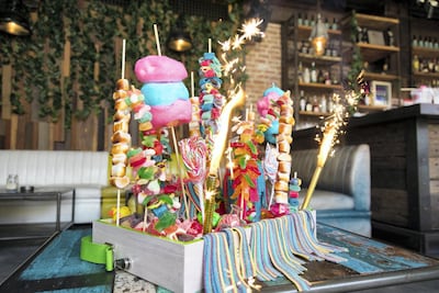 A dish featuring lollipops, candy floss, popping candy and popcorn from Lock, Stock & Barrel's new brunch. Courtesy of Lock, Stock & Barrel