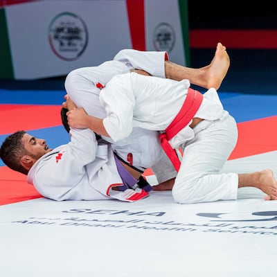 Zayed Al Katheeri, left, has Brazilian Everton Celio in a triangle choke. Courtesy UAEJJF